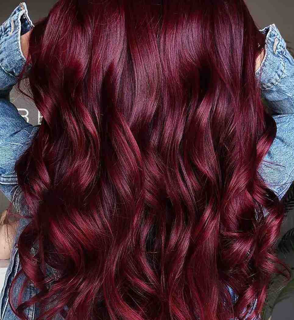 Purple shampoo can help keep the colors of red hair dye.
