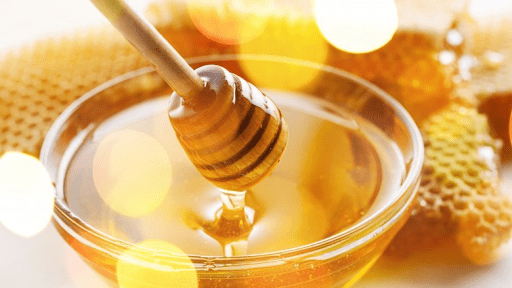 You can use honey in several mixtures to lift dark hair color.