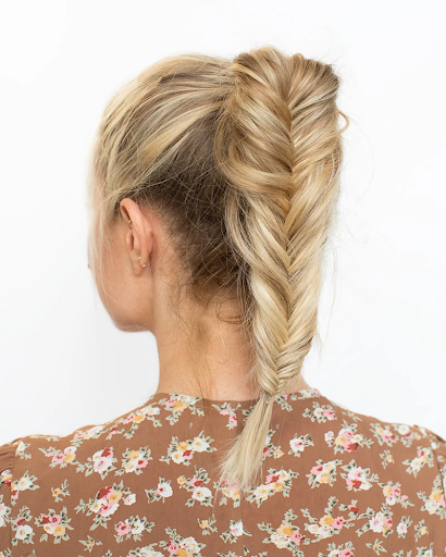 A fishtail ponytail is an excellent way to hide hair extensions. 