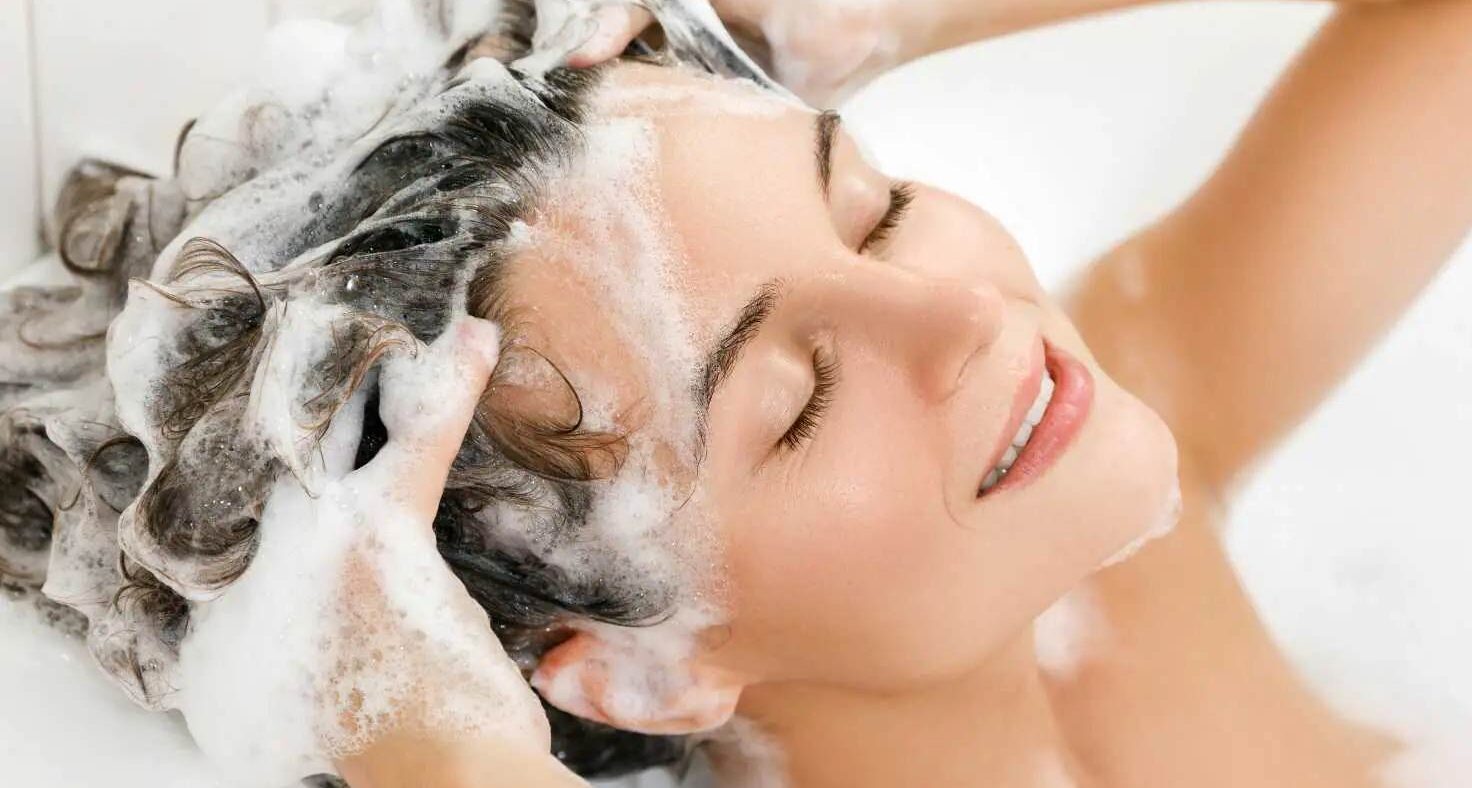 Using lukewarm water is best to protect your hair color
